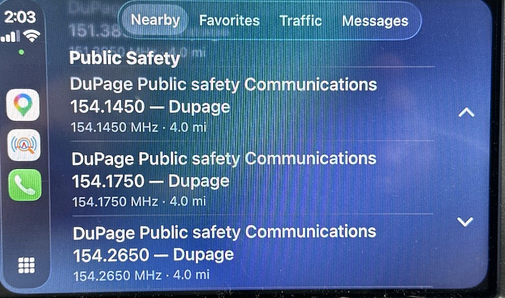 CarPlay Nearby tab listing local public-safety dispatch channels by distance